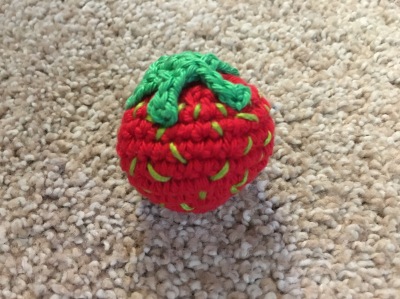 Here is a strawberry that i crocheted,i love making little things like this. So much fun.